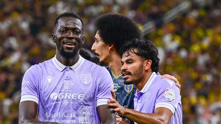 Al Taawoun's Musa Barrow (L) celebrates wonder goal v Al Ittihad