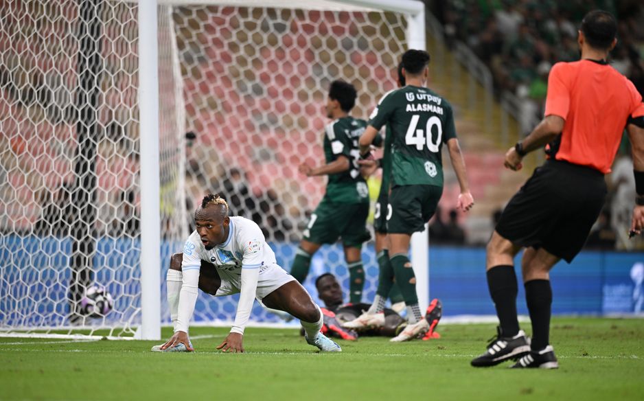 Al Okhdood forward Saviour Godwin scores v Al Ahli