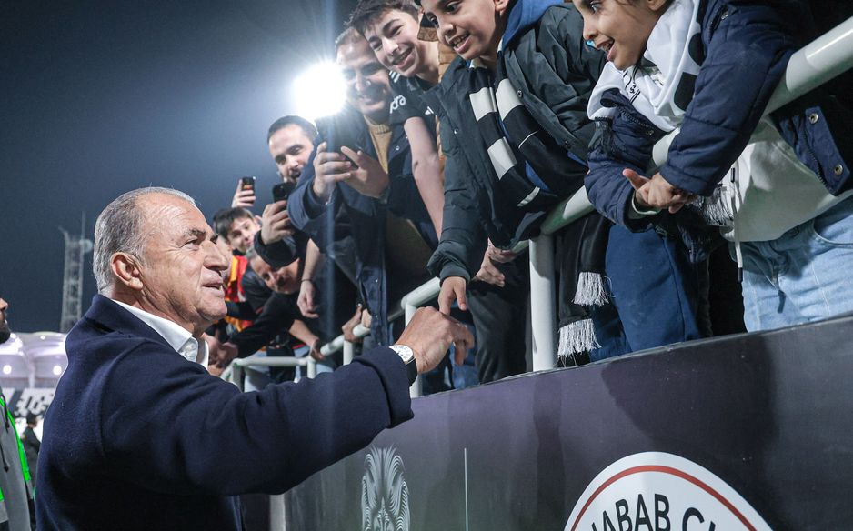 Al Shabab manager Fatih Terim greets fans v Al Riyadh