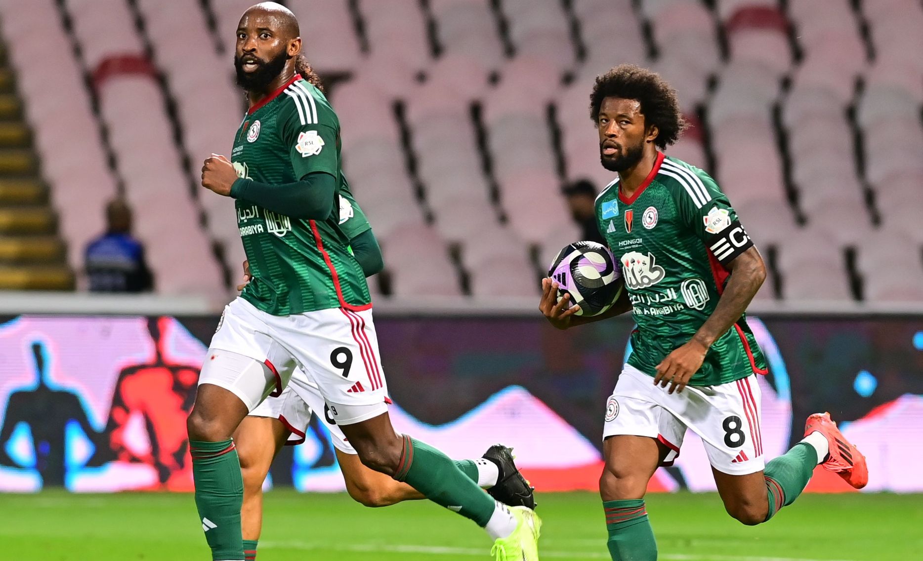 AL Ettifaq captain Georginio Wijnaldum (R) and striker Moussa Dembele