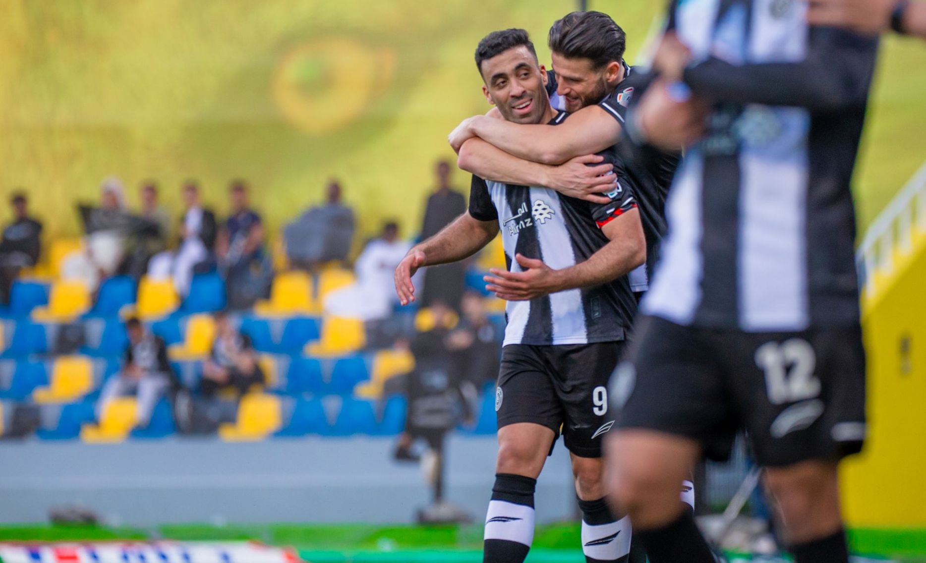 Abderrazak Hamdallah celebrates goal at Al Taawoun