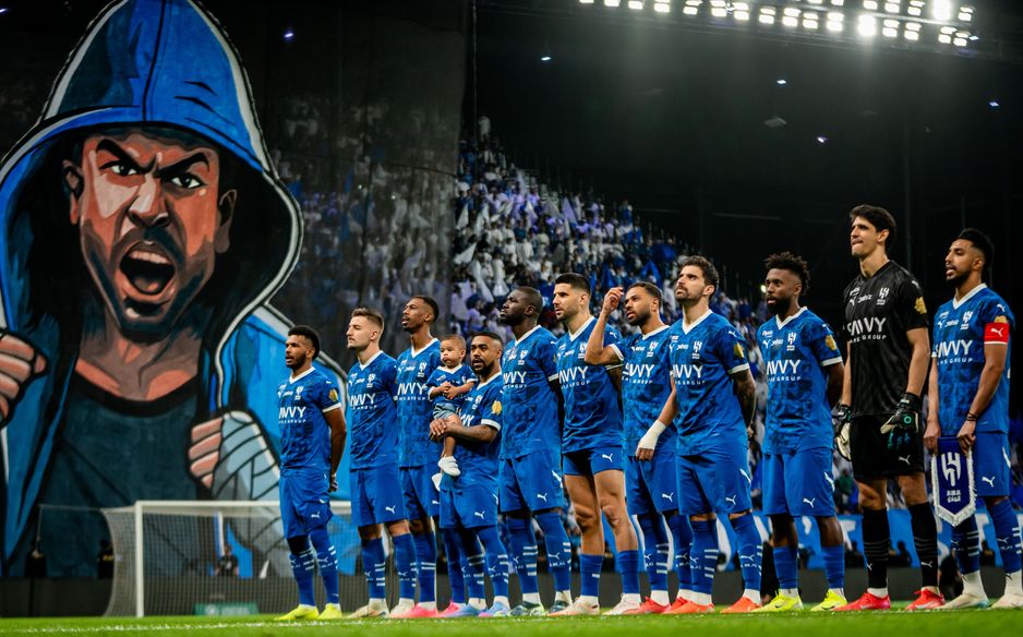 Al Hilal players line up in front of huge fan tifo before Capital Derby with Al Nassr