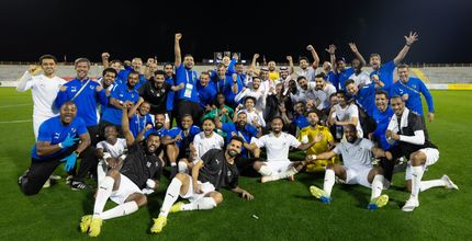 NEOM celebrate securing promotion to RSL