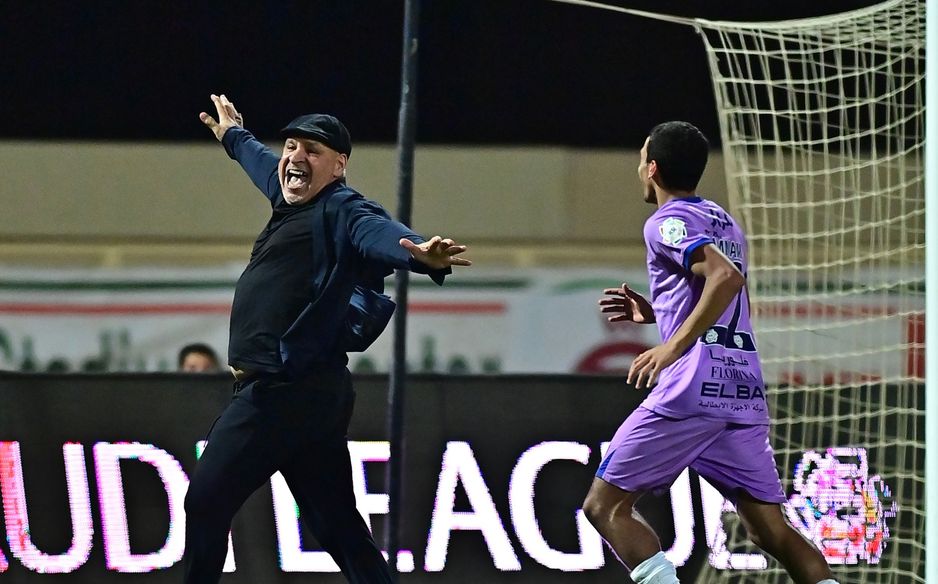 Al Kholood manager Noureddine Ben Zekri celebrates RSL survival