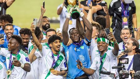 Al Ahli goalkeeper Edouard Mendy lifts the Saudi Super Cup