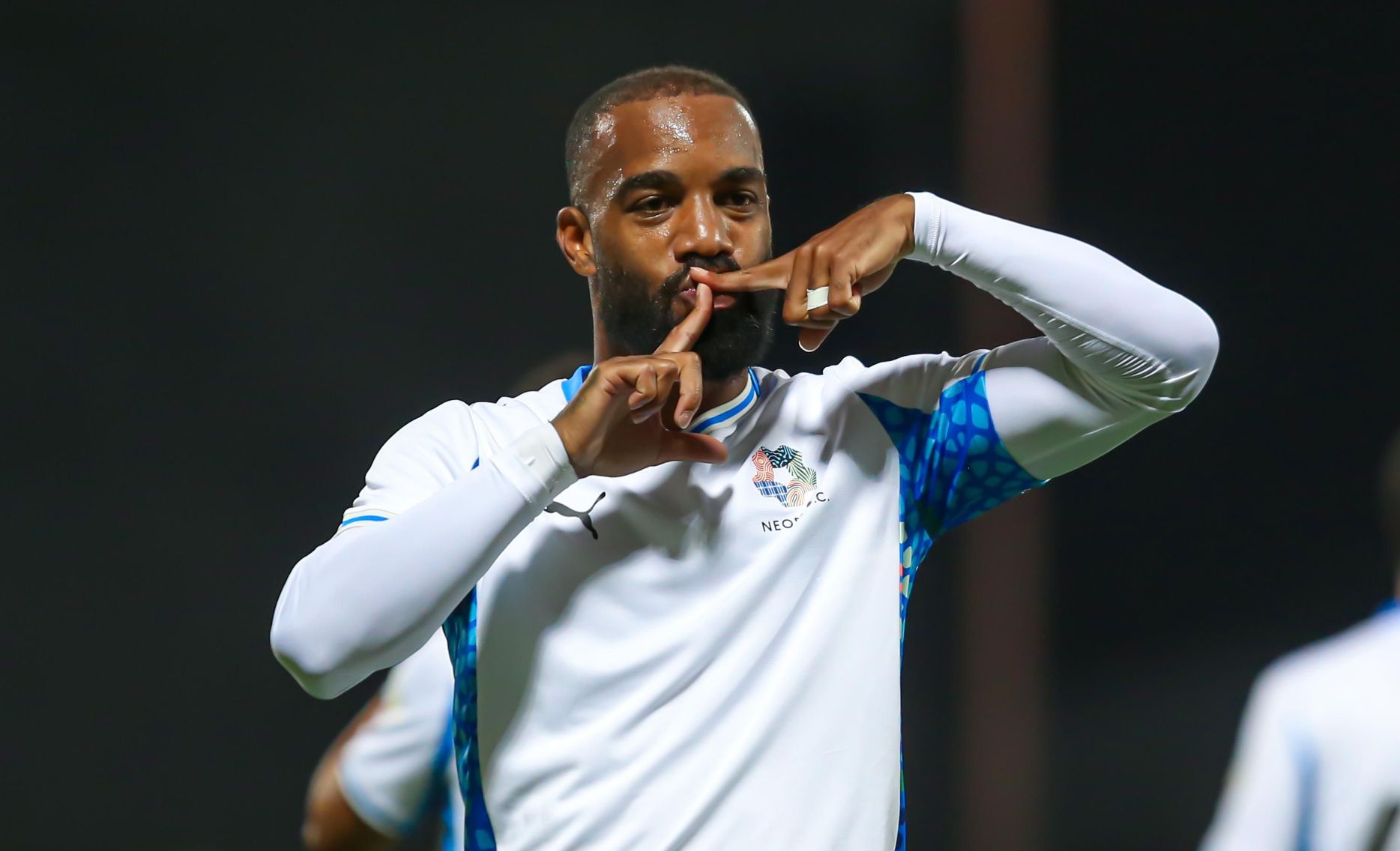 Alexandre Lacazette celebrates goal for NEOM SC at Damac