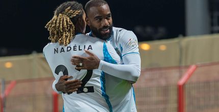 NEOM SC's Saimon Bouabre and Alexandre Lacazette celebrate goal at Damac