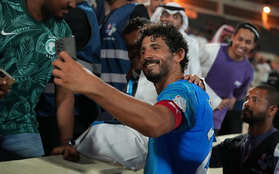 NEOM captain Ahmed Hegazi with fans after Al Okhdood win