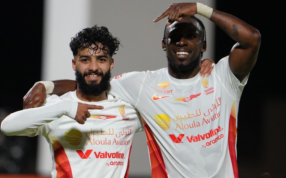 Al Qadsiah duo Julian Quinones and Mohammed Abu Al Shamat celebrate at NEOM SC