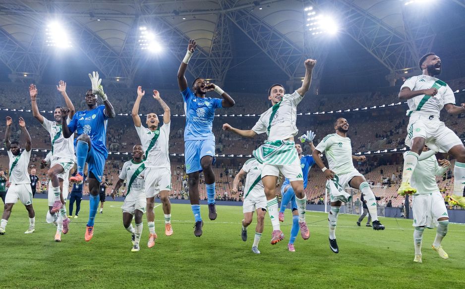 Al Ahli players celebrate their latest victory in a Sea Derby v Al Ittihad