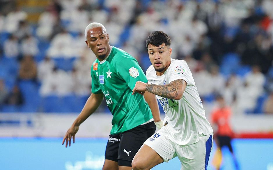 Deiby Flores (L) is crucial for both club, Al Najmah, and country, Honduras