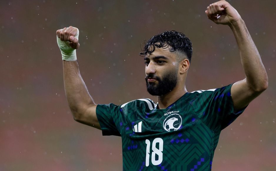 Saleh Abu Al Shamat celebrates his winner for Saudi Arabia v Cote d'Ivoire