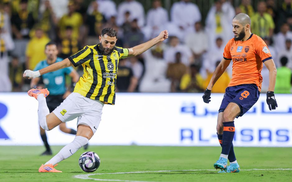 Al Fayha midfielder Yassine Benzia in action against Al Ittihad captain Karim Benzema