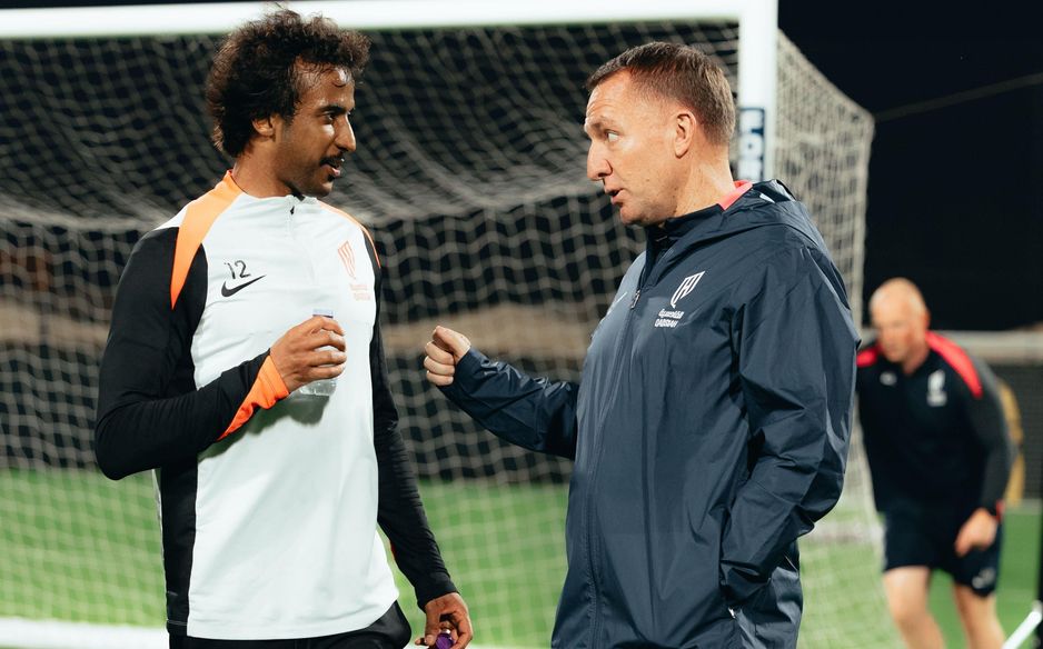 Brendan Rodgers in conversation with Al Qadsiah full-back, and RSL great, Yasser Al Shahrani