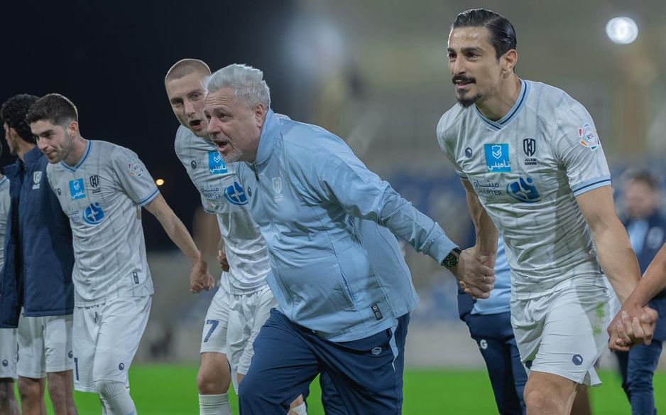 Al Okhdood celebrate home win v Al Kholood