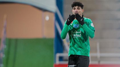 Al Najmah forward Ali Jasim equalises v Al Fateh