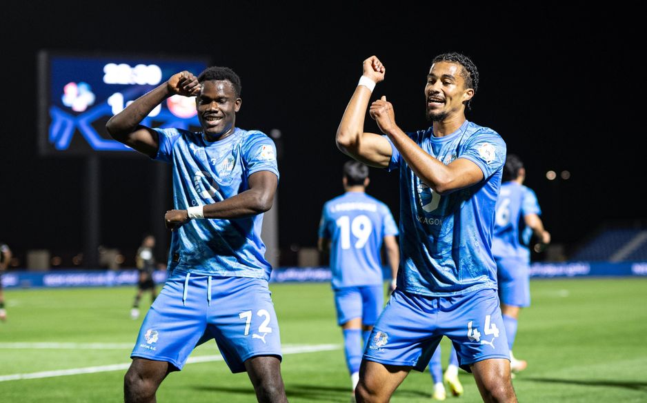 NEOM SC's Amadou Kone (L) and Nathan Zeze celebrate goal in win v Damac 