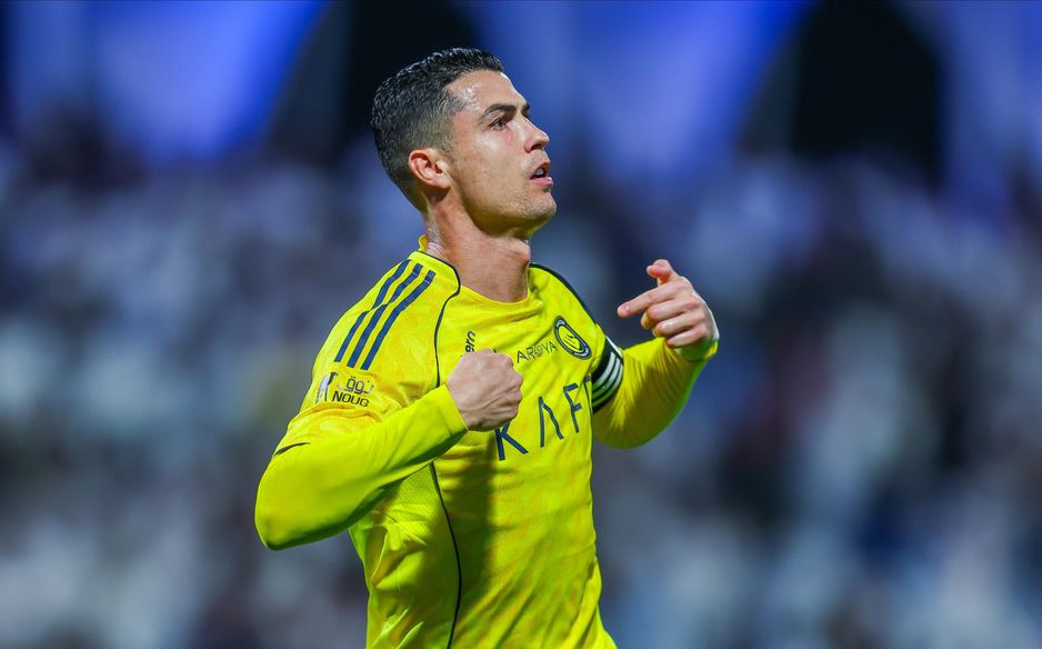 Cristiano Ronaldo motions I'm here after marking his return to the pitch with Al Nassr's opener at Al Fateh