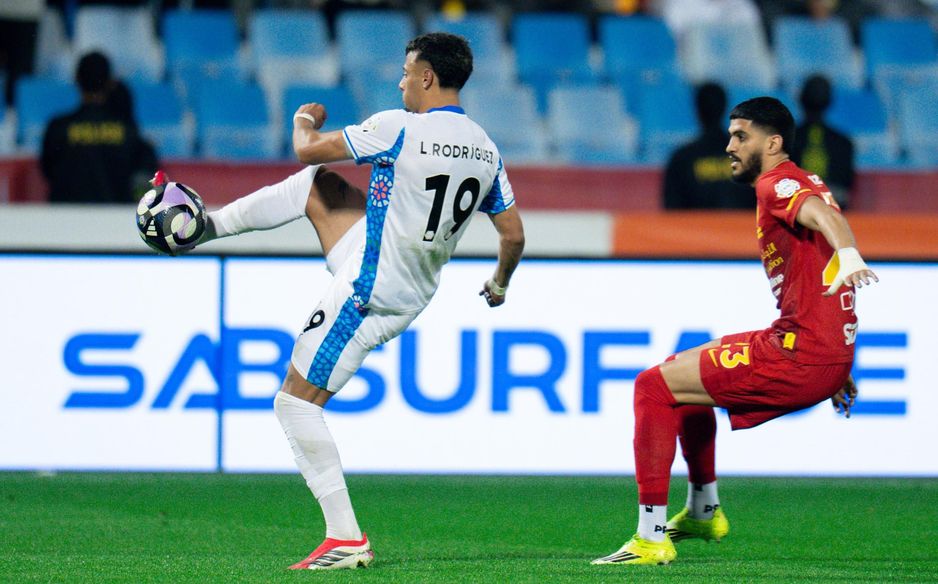 New Al Qadsiah man Waleed Al Ahmed (R) ensured his team kept out NEOM SC