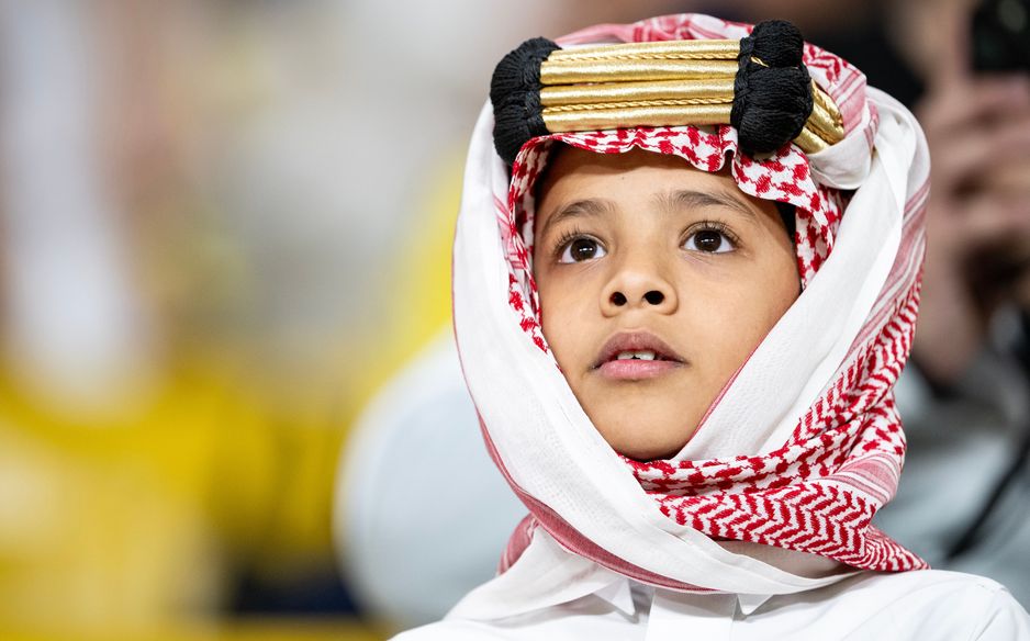 A young fan takes in a match during Founding Day celebrations