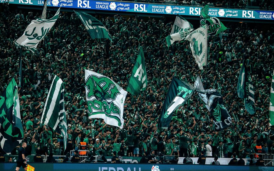 Al Ahli supporters illuminate the Sea Derby v Al Ittihad