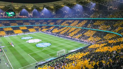 Al Ittihad fans celebrate the club passing the five-million mark in RSL attendance