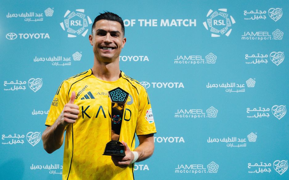 Cristiano Ronaldo picks up the Man of the Match award following his brace in Al Nassr's win v Al Najmah