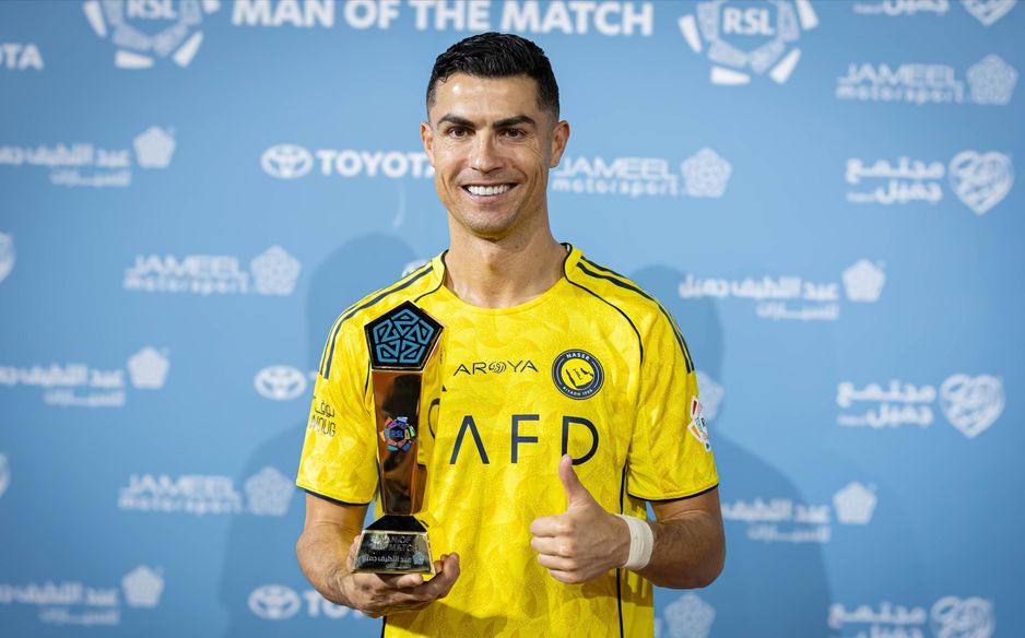 Cristiano Ronaldo collects Man of the Match award following Al Nassr's win at Al Okhdood