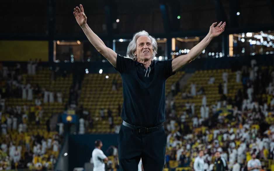 Al Nassr manager Jorge Jesus celebrates victory v Al Ettifaq with supporters