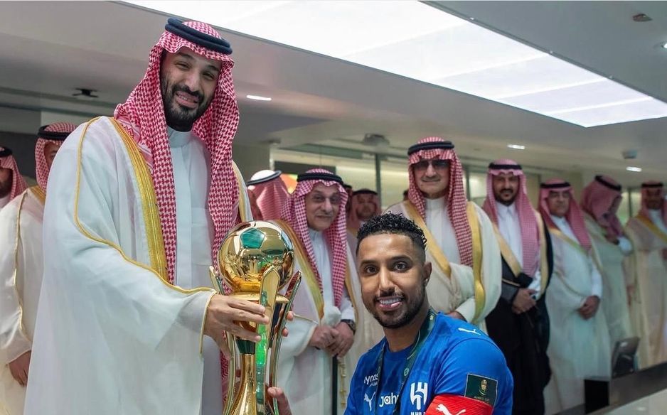 Al Hilal captain Salem Al Dawsari collects the King's Cup trophy from His Royal Highness Crown Prince Mohammed bin Salman