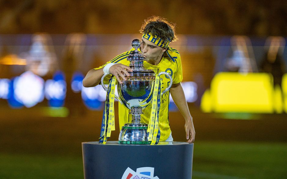 Joao Felix with the 2025-26 RSL trophy