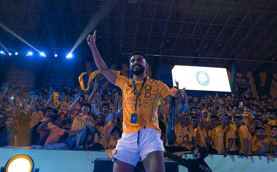 Centre-back Abdulelah Al Amri celebrates Al Nassr title win in front of club's Ultras