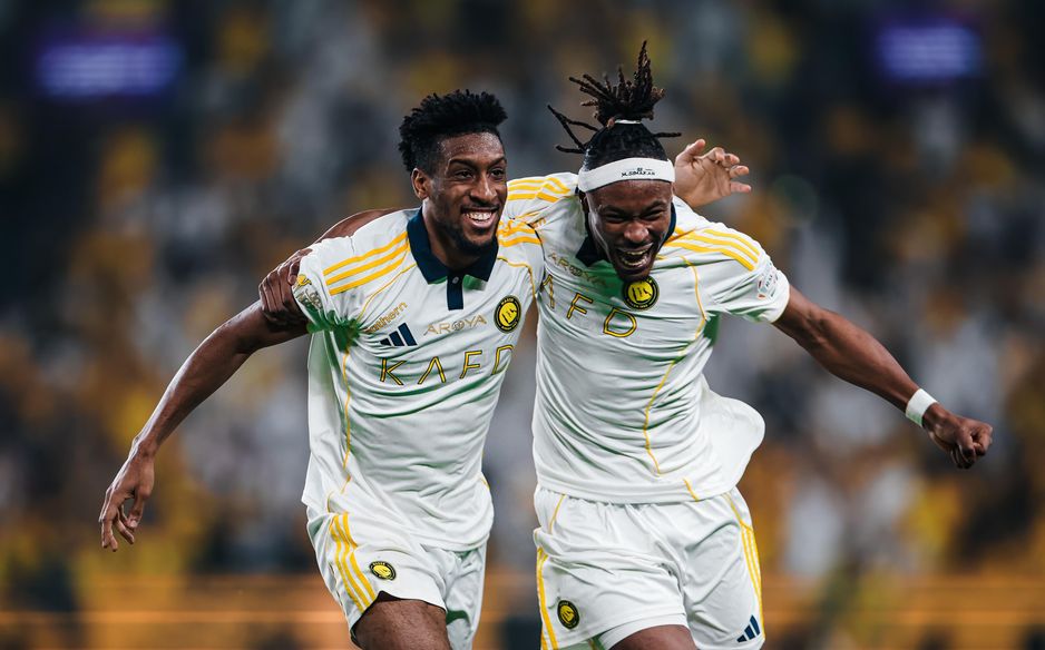 Kingsley Coman (L) celebrates doubling Al Nassr's advantage in title-decider v Damac