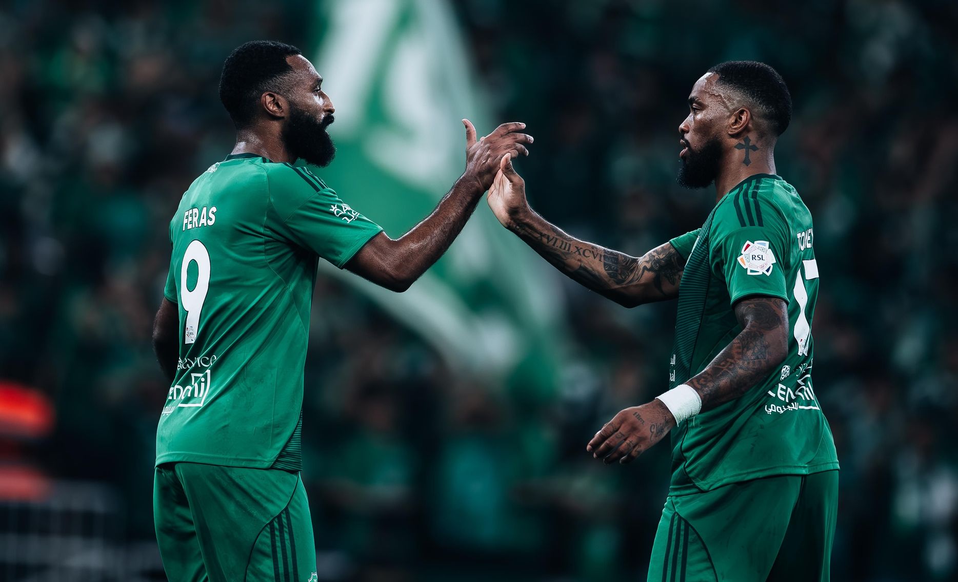 Al Ahli duo Feras Al Buraikan (L) and Ivan Toney