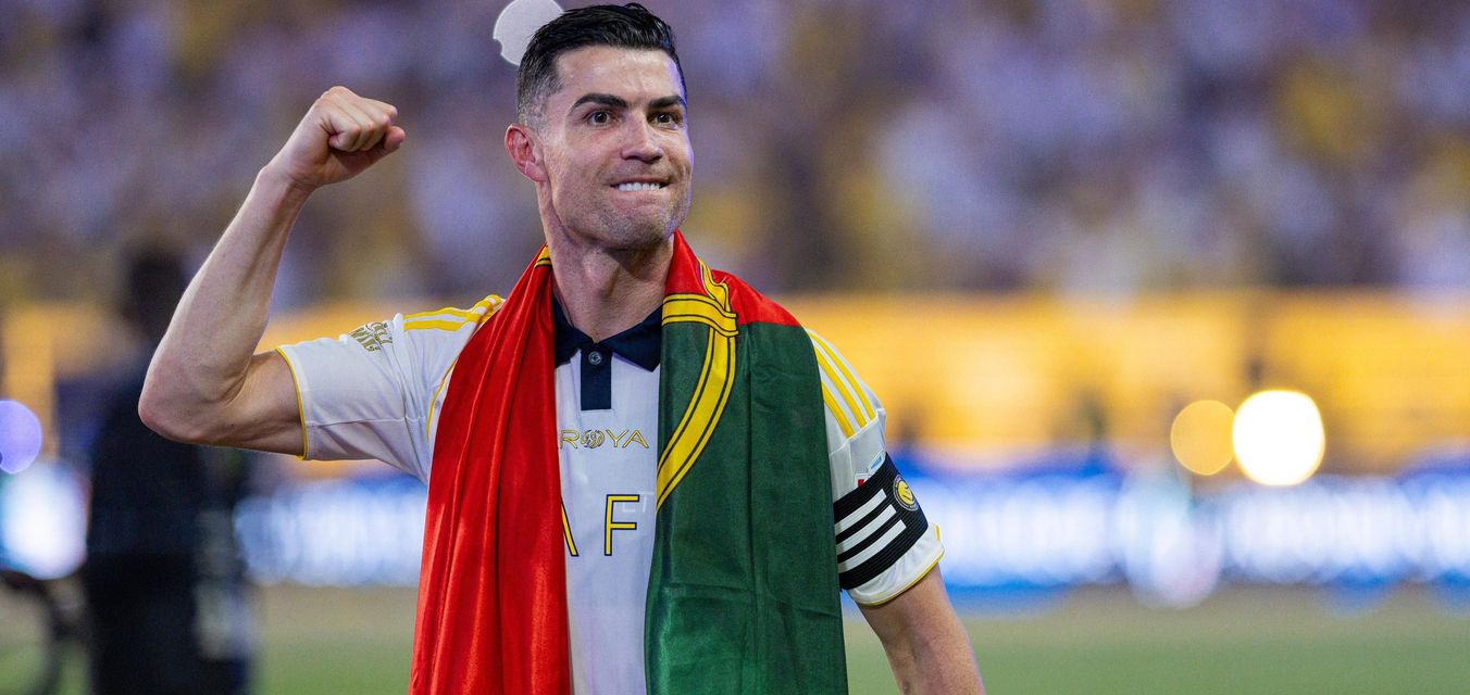Cristiano Ronaldo draped in Portugal flag after firing Al Nassr to RSL title