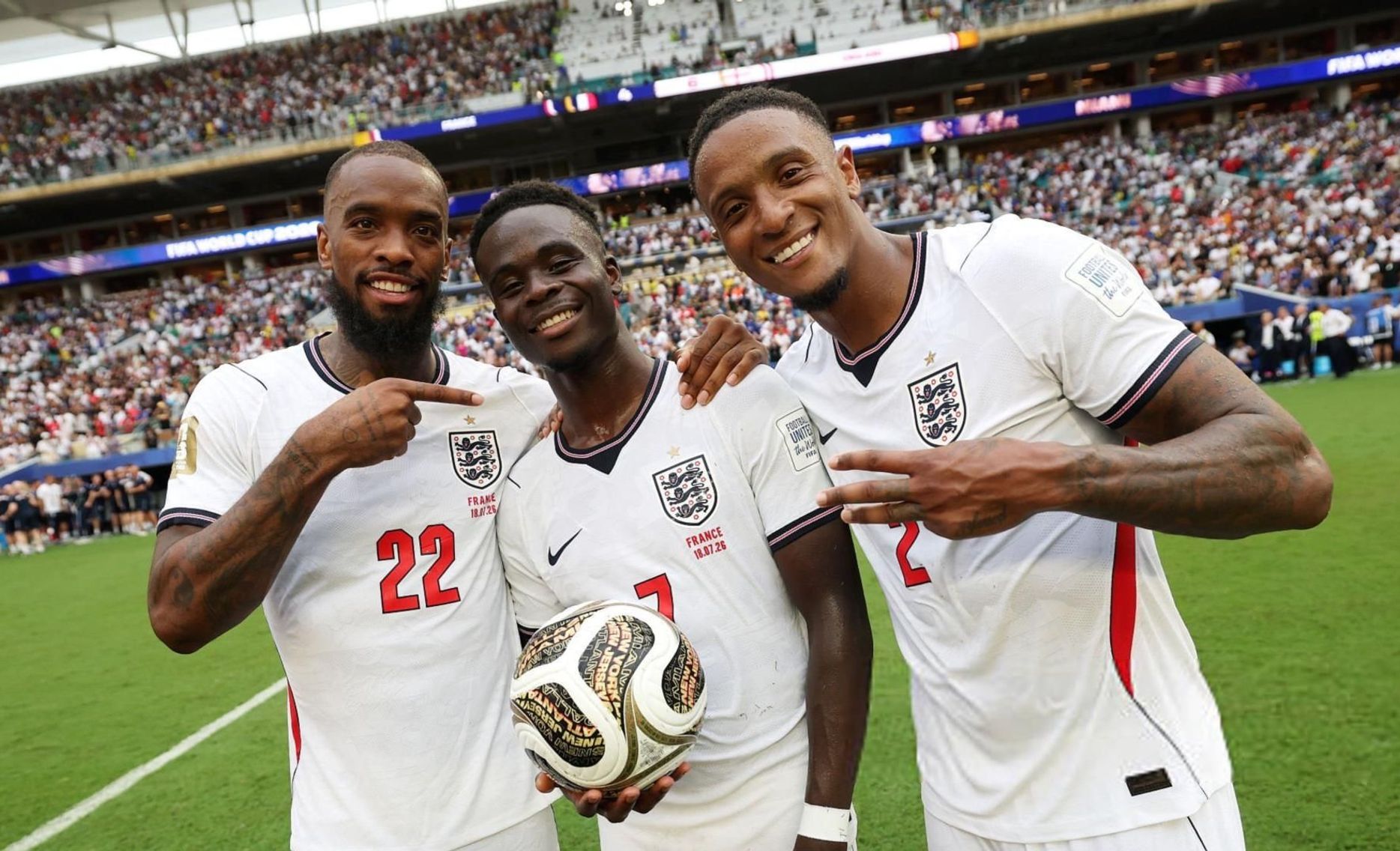 Ivan Toney (L) celebrates England's bronze at FIFA World Cup after France win